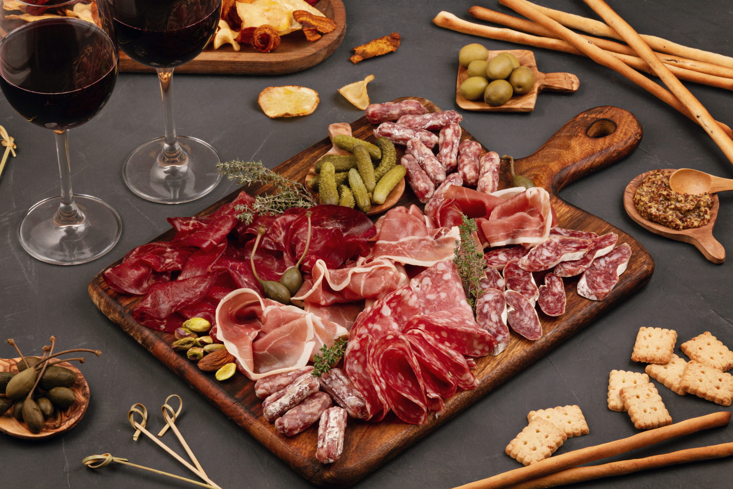 Appetizers table with differents antipasti, cheese, charcuterie,